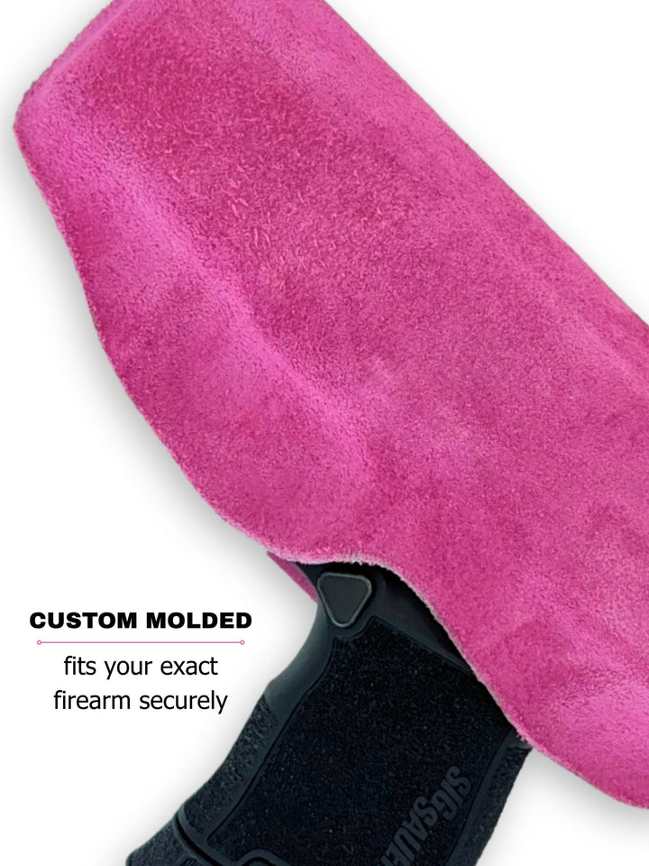 Berry Suede Flashbang bra holster showing its custom-molded fit for women's concealed carry #flashbang-color_suede-wrapped-teddy-berry