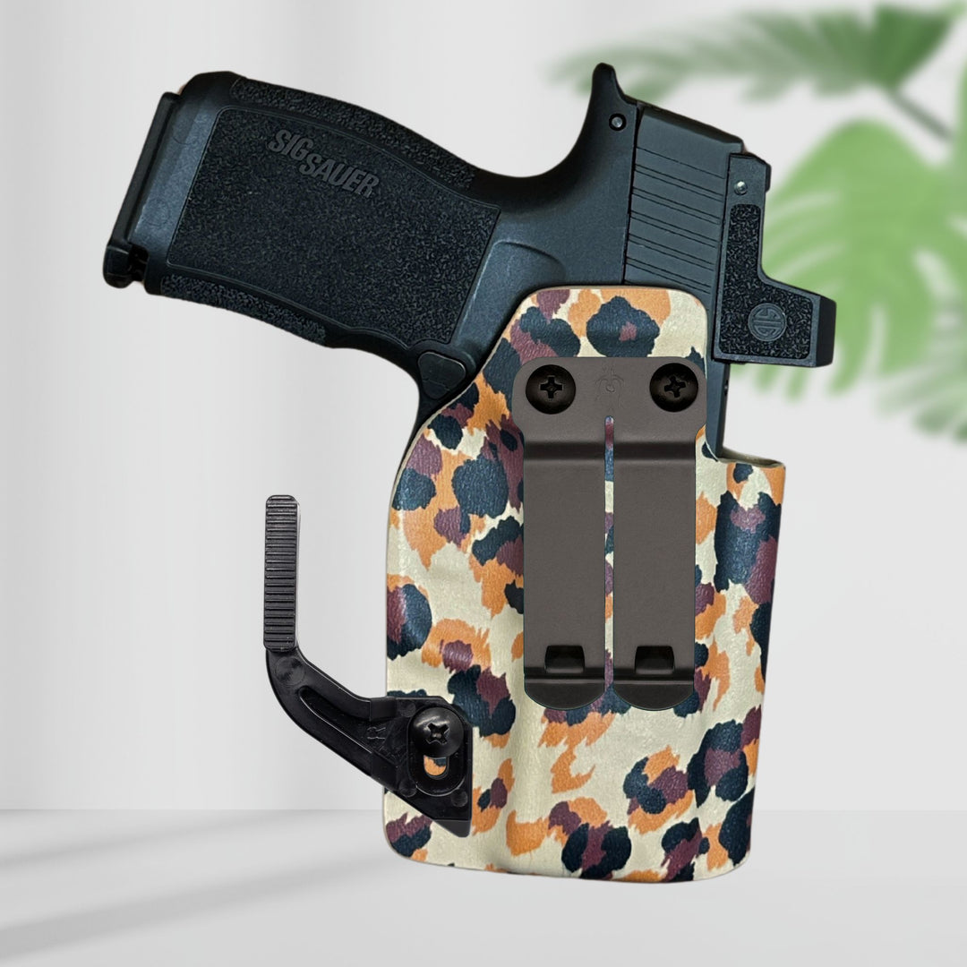Concealed carry holster amelia dcc with concealment wing cheetah print with background