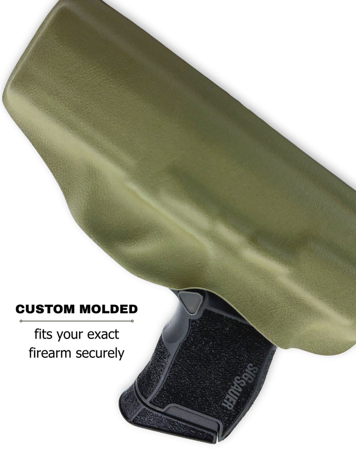 Leaf Green Flashbang bra holster showing its custom-molded fit for women's concealed carry #flashbang-color_leaf-green