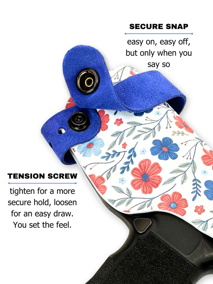Red White & Bloom Marilyn side-bra holster showing the secure retention snap for women's concealed carry #color_red-white-bloom