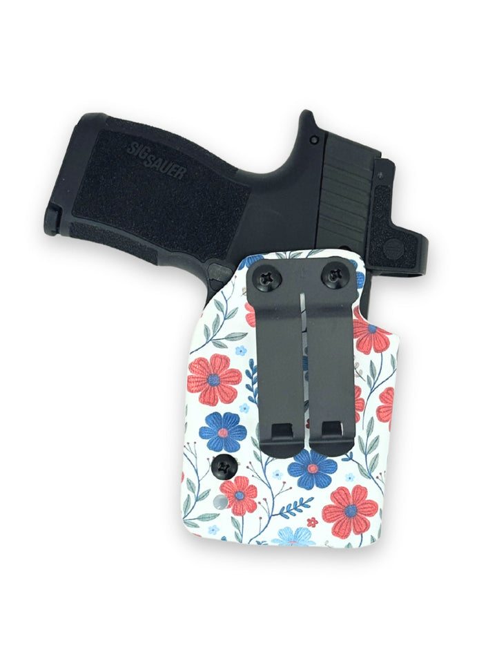 Amelia IWB concealed carry holster with DCC Monoblock, front view, in Red White & Bloom #color_red-white-bloom