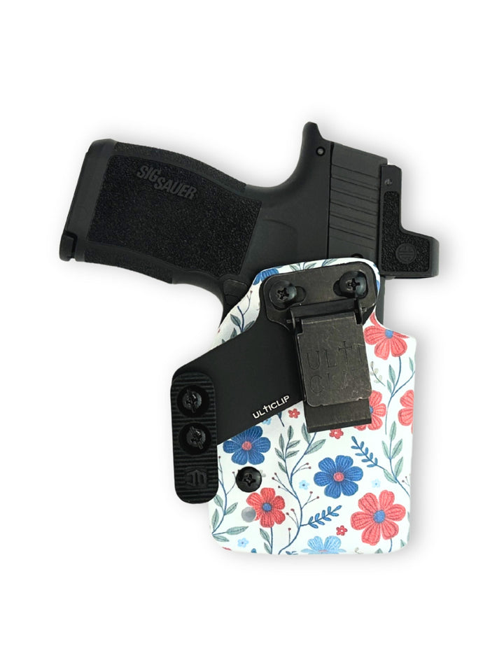 Amelia IWB concealed carry holster with Ultituck clip and tuckwing, front view, in Red White & Bloom #color_red-white-bloom