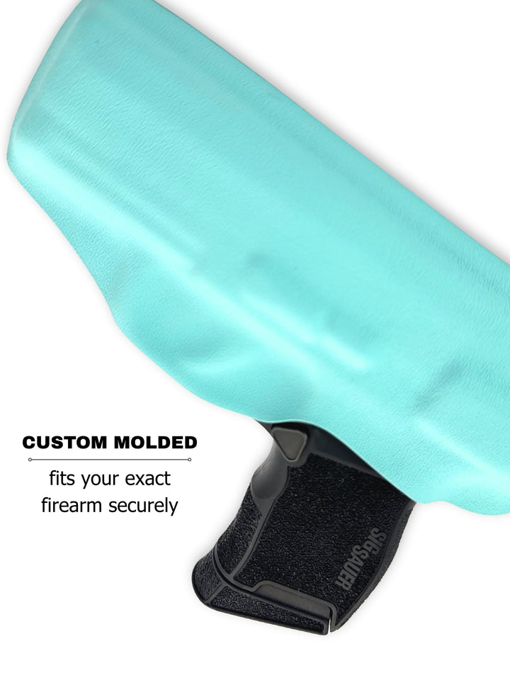 Tiffany Blue Flashbang bra holster showing its custom-molded fit for women's concealed carry #flashbang-color_tiffany-blue