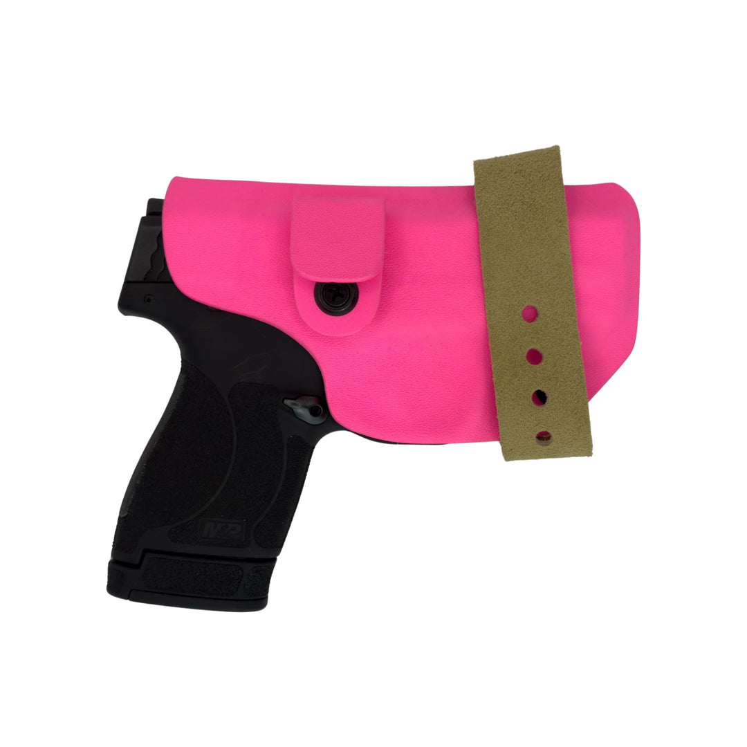 Pink gun holster with a black gun inside on a white background